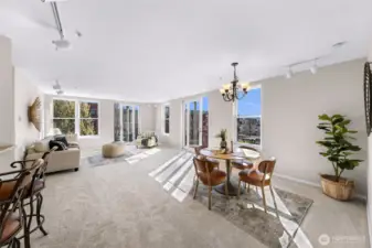 South and west-facing sliders open to Juliet balconies on both sides