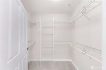 Primary suite walk-in closet, ready for your garments, shoes and hats!