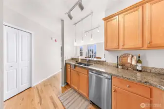 Large pantry w/ storage, across from kitchen