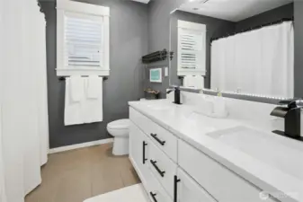 Upstairs full bathroom with updated Quartz counters and paint