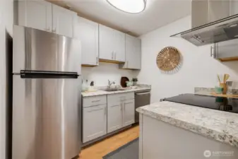 Kitchen with newer refrigerator