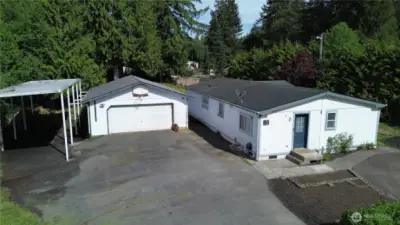 Doublewide REMODELED Manufactured home with a HUGE garage/ shop and RV Parking On a nice  Half acre corner lot