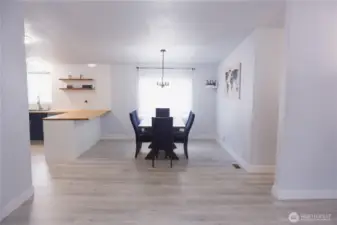 View from Living room to the dining and kitchen