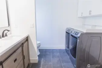 Master bath / laundry room (washer and dryer stays )