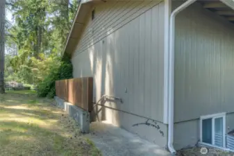 Side door entrance to downstairs basement.
