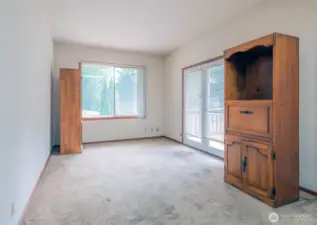 2nd Living room/family room area showing French doors to deck.