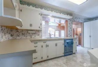 Kitchen is open to the sitting/family room for easy entertaining.
