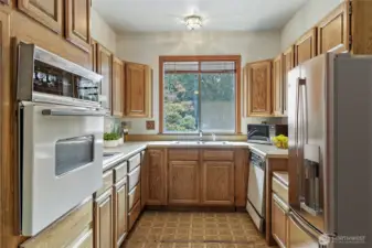 2nd kitchen next to primary suite. This wing of the home has been used as separate living quarters.