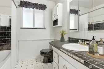 Full bath in this wing adjacent to bedrooms