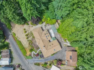 Drone shot of home, outbuildings and yard. Remember that the septic system was redone in Spring of 2025.