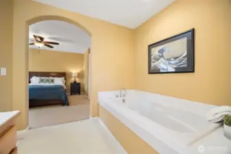 Looking out to the bedroom from the bathroom