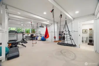 Downstairs has another living space. Flexible to be a workout room, family room, theater or hobby room or anything you dream of