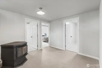 Lower level foyer with 3 bedrooms, and full bath, utility/mud room to back yard