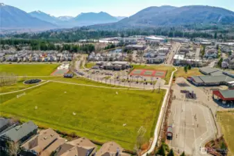 Play fields, a new splash pad, bathrooms the YMCA and walking trail too. All right next to the elementary school