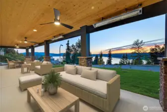 Enjoy lower level covered patio with both fans and heating elements for year round enjoyment.