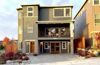 The Glacier Home Plan. All photos, renderings, site maps, and floorplans are for visualization purposes only. Plans, colors, building orientation, finishes, home outlook, and other details can and WILL vary. Striking three-level Glacier plan showcases a modern Craftsman façade with brick accents, vertical siding, and oversized windows for maximum natural light. Covered balcony and welcoming entry set the tone for refined living in Bothell’s Foxmoore community, close to Canyon Park conveniences and I-405 access.