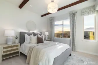 Primary bedroom with west facing mountain views.