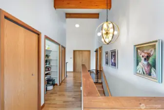 View from Entry - Storage and staircare to Lower Level (primary bedroom straight ahead & 2nd bedroom to the immediate right)