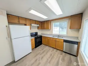 Kitchen overlooks the huge back yard.