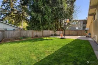 Large level and fully fenced play yard.