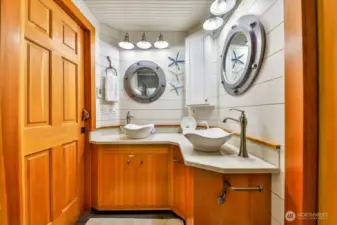Custom bathroom on main floor with shower. There are 3 bathrooms total.