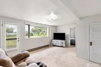 Currently used as a 2nd living room on the lower level. This room could is technically considered a bedroom with the walk out to the patio.