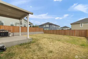 This fully fenced, flat backyard offers a safe and spacious canvas for gardening, entertaining, or letting pets and kids run free.