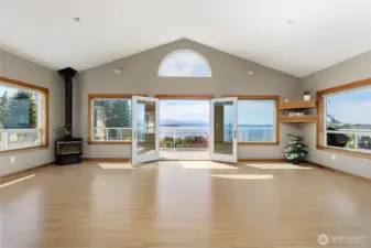 On the right is all set up for surround sound, on the left is the propane stove for cozy winter...and the wonderful view!!!