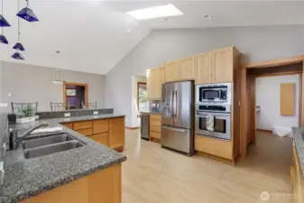 Wine / drink fridge comes in handy.  doorway on the right leads to utility room and pantry