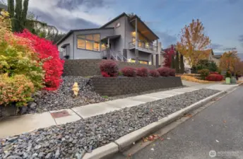 Fully fenced, irrigated terraced yard maximizing privacy and stunning scenery from all angles.