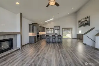 Large Open Main Level with vaulted ceilings & LVP.