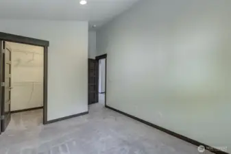 Third bedroom upstairs offering flexible space for guests or home office.