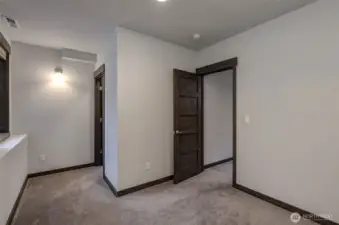 Fourth bedroom located on lower level, ideal for multi-generational living.