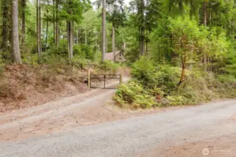 Gated entry at bottom of driveway