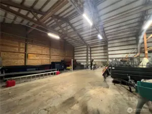 High ceilings, cement floor & elevated loft, make this building even larger inside than it appears from the outside.