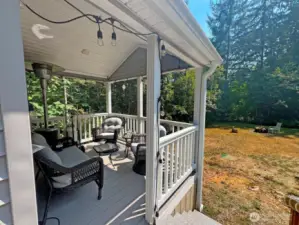 Attached porch for an evening beverage.