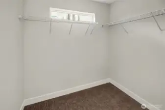 Walk-in Closet With Clean White Wire Shelving