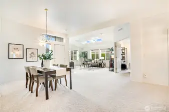 The living and dining room are open, airy and beautifully lit. Generously sized windows and well placed skylights provide great natural lighting