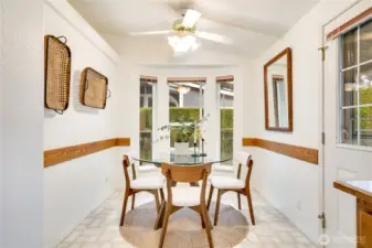 Attached dining nook. Drink your coffee and watch the birds play