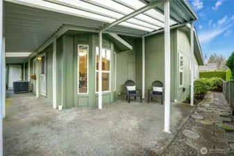 Covered patio located off of the kitchen. Enjoy this space year round.