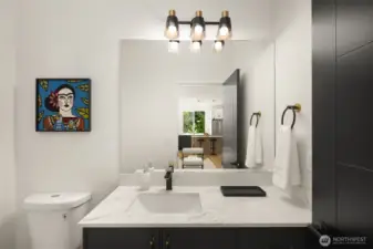 Half bath, perfect for guests  *Photos are of 8513A which features a similar floor plan