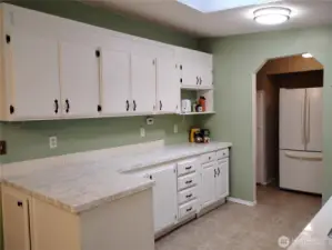 There will be more pictures to come.  The Kitchen has a fridge, oven, dishwasher and double sink.  There are two skylights in this home.  Plenty of outlets along the kitchen counters!