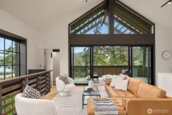 Pella doors open wide to a covered deck with views over Puget Sound's beautiful Rich Passage