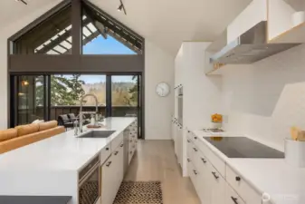 Stainless Bosch appliance package, ample storage, and bar area with 2nd sink (not shown)
