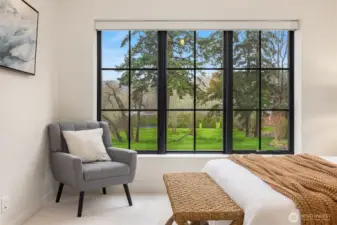 High ceilings and beautiful windows showcase the view