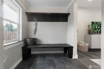 Entryway with built-in made form antique workbench from the basement