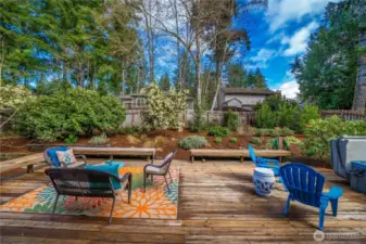 Large deck is great for relaxing and entertaining in your backyard oasis!