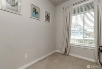 Main floor bedroom or office with a closet