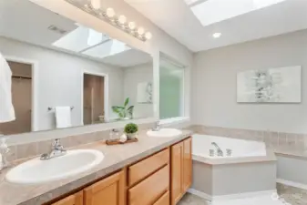 Master bath with dual sinks and sunken tub