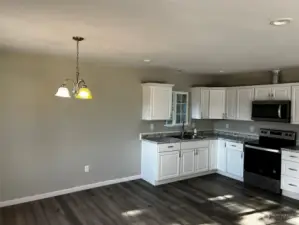 Kitchen showing dining area